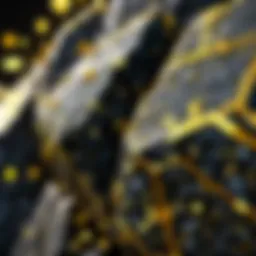 A close-up view of black rock featuring shimmering gold sparkles.